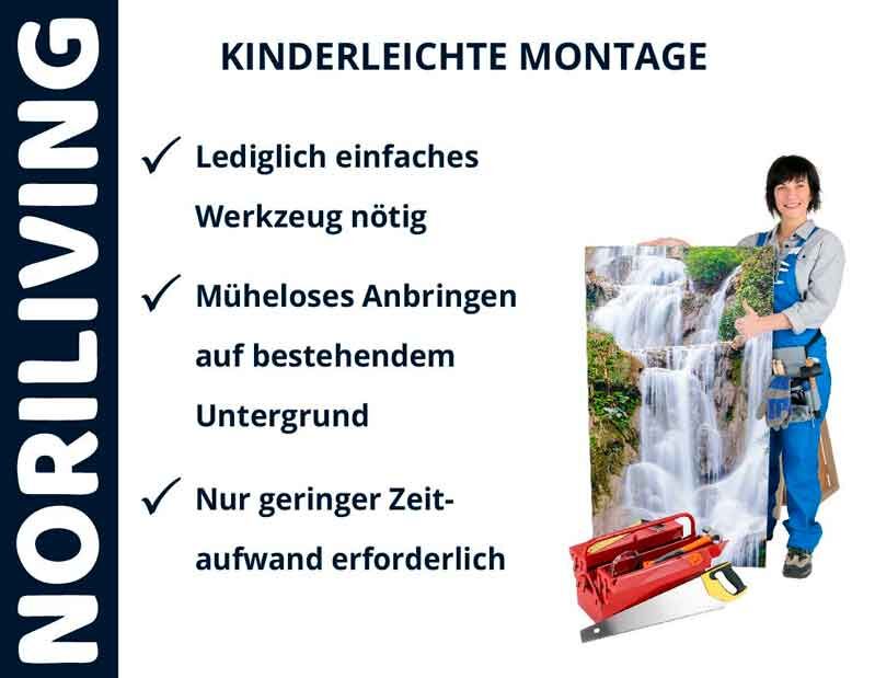Person in Arbeitskleidung präsentiert ein leicht montierbares Wandbild mit Noriliving-Werkzeug