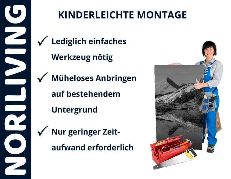 Person zeigt einfache Montage eines Bildes mit Werkzeugkoffer, kinderleichte Montage hervorgehoben