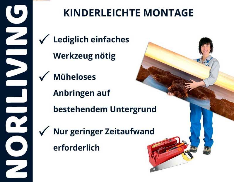 Person trägt großformatiges Bild mit einfachem Montageset