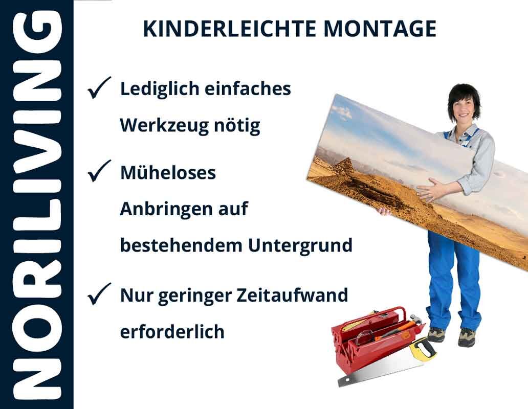Person zeigt einfach zu montierende Wanddekoration von NORILIVING, minimaler Werkzeugaufwand nötig