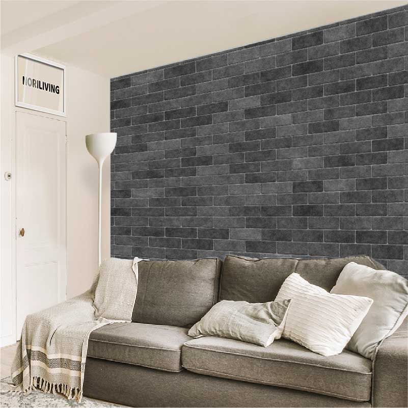 im Wohnzimmer eingebaute Wohnzimmerrückwand mit Motiv graue Ziegelmauer groß 995 schwarz-weiß