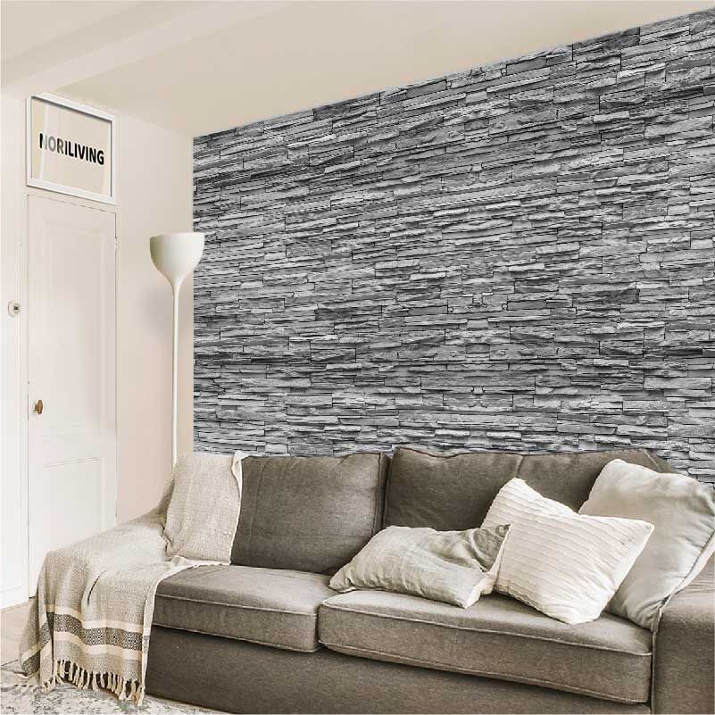 im Wohnzimmer eingebaute Wohnzimmerrückwand mit Motiv Steinverblender Schiefer hell 3441a schwarz-weiß