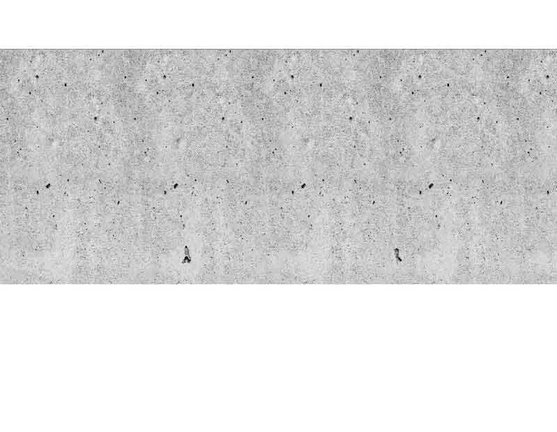 Nahaufnahme einer grauen Betonoberfläche mit sichtbaren kleinen Löchern und unregelmäßiger Textur