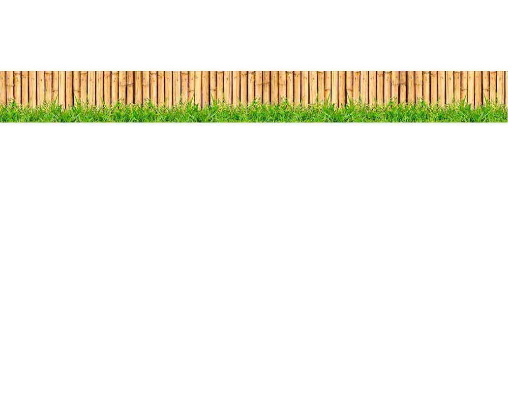 Holzzaun im Garten mit Gras im Vordergrund