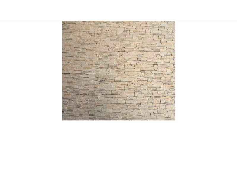 Wand aus beigefarbenem Naturstein in einem geometrischen Muster