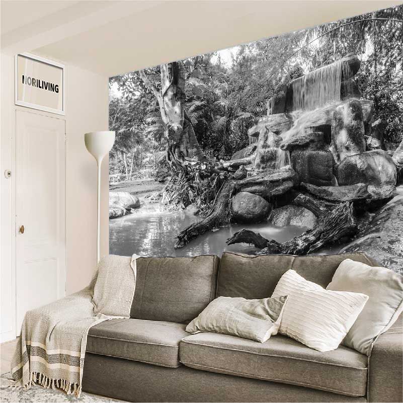 im Wohnzimmer eingebaute Wohnzimmerrückwand mit Motiv angelegter Wasserfall im Gartenpark 288 schwarz-weiß