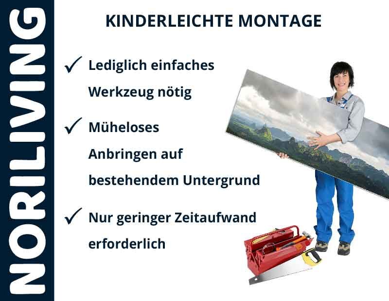 Person zeigt einfache Montage mit minimalem Werkzeug für Wanddekoration.